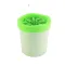 Small container with a green lid on a white background