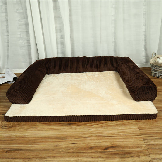 Brown and beige pet bed on a wooden floor with white curtains in the background